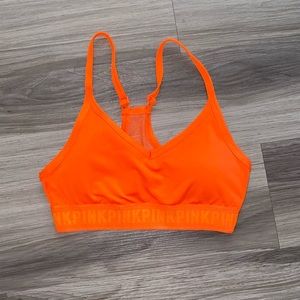 PINK neon orange sports bra
